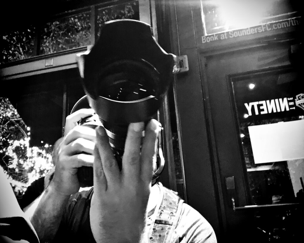 Photographer uses a lens hood indoors