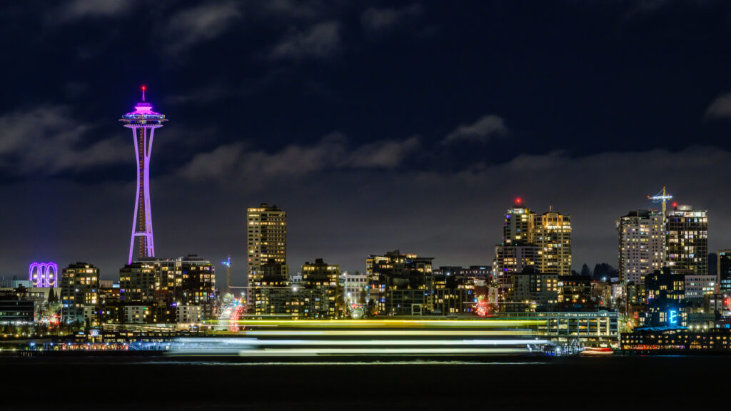 Ferry in front of Seattle's Space Needle