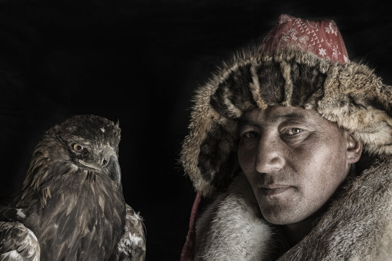 Mogolian eagle hunter and golden eagle