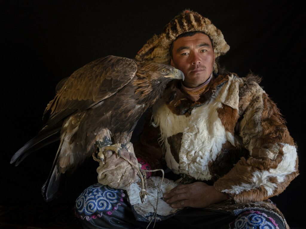 Mongolian eage hunter and his golden eagle