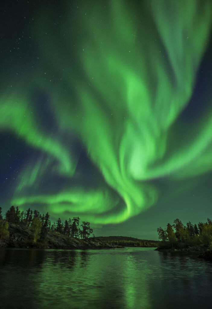 The skies get painted by the aurora in Northwest Territories in Canada
