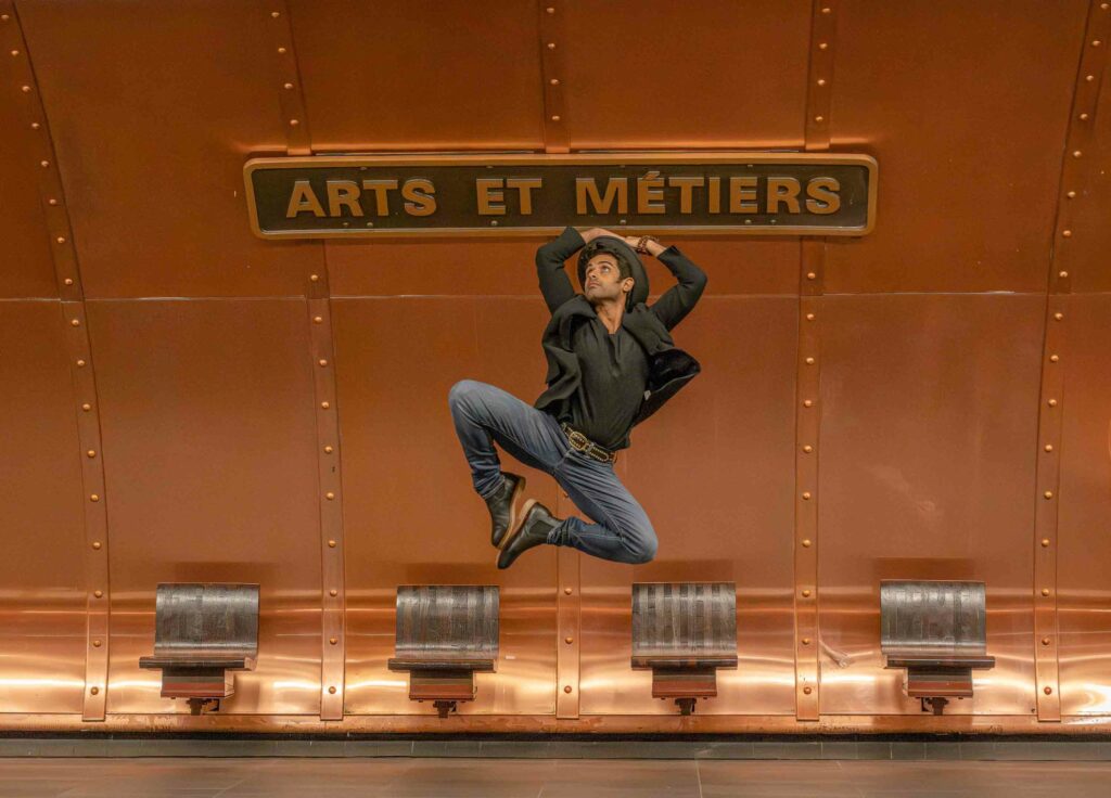 A dancer performs in the subway system in Paris