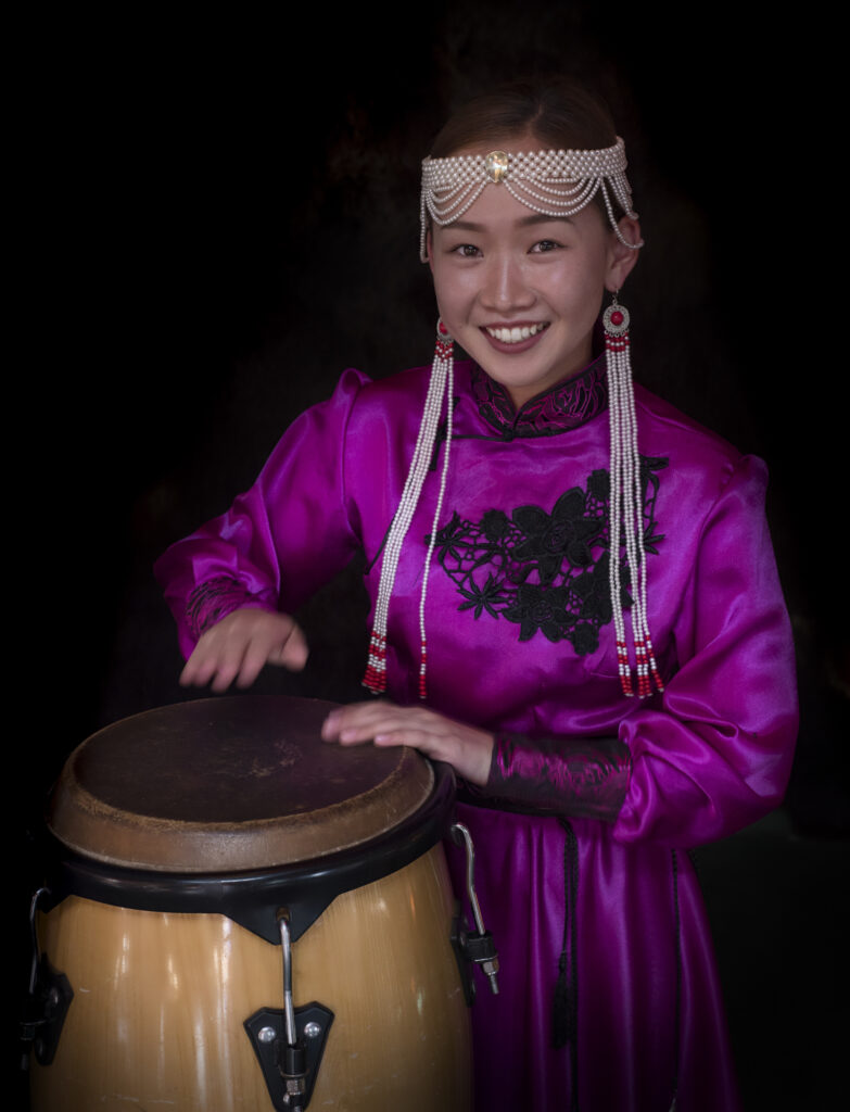 Mongolia girl with drum